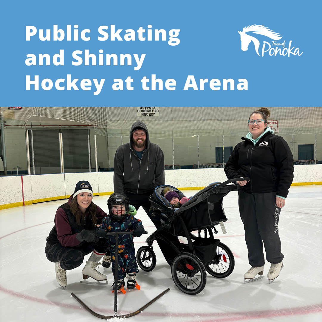 A family skating on the ice at the Ponoka Arena Complex.