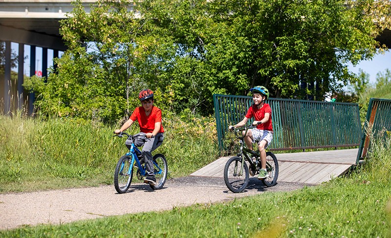 Kids riding their bikes in the Battle River Valley